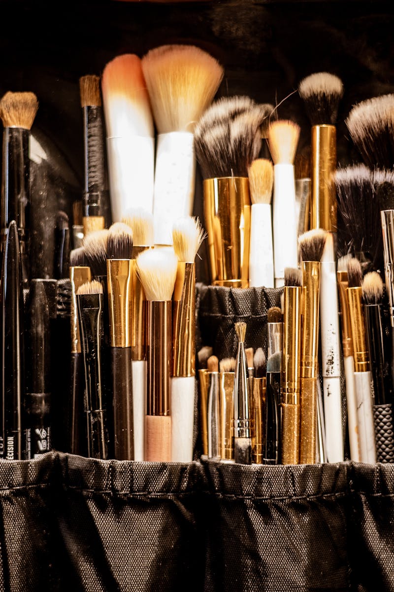 A diverse set of makeup brushes neatly arranged in a professional case, showcasing variety and quality.